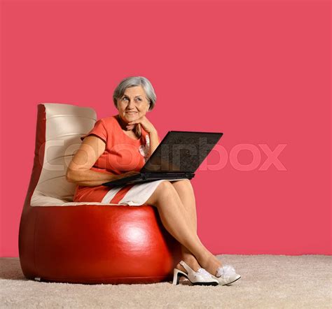Mature Woman With Laptop Stock Image Colourbox