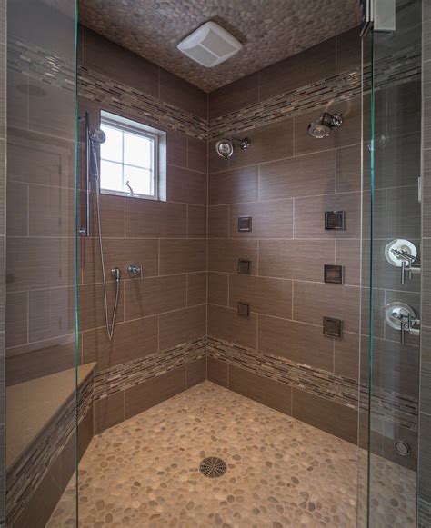 For the residential user, ceiling sloped a half inch per foot away from the. Finksburg, MD: This luxurious shower features a frameless ...