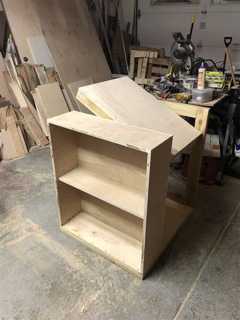 Diy small open shelf building plan. Flip top workbench | Woodworking bench, Garage cabinets ...