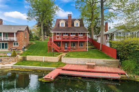 Exquisite Tudor on Portage Lakes – Exactly