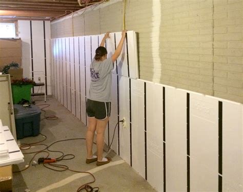 Choosing your basement ceiling can be tricky! Floor-to-Ceiling Insulation in a Brick Wall Basement ...