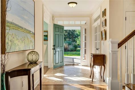 Designer luxury waterfront with pool dock and sunsets. Sag Harbor home on three acres was once part of a farm ...