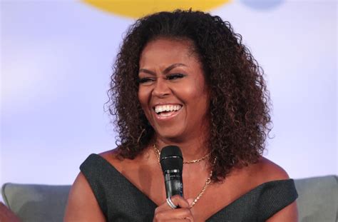 Michelle Obama Applauded For Rocking Her Natural Curly Hair While