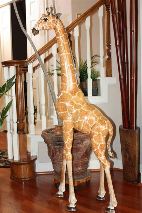 These handcrafted animals perform their duties with good cheer. Wooden Carved Giraffe 5FT.Tall His name is 'Barongo'! If ...