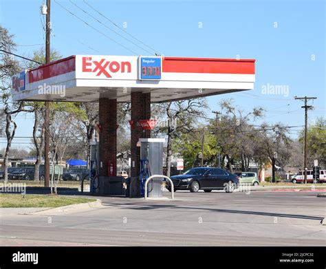 Exxon gas station pumps at a 7-11 store in Irving, Texas Stock Photo