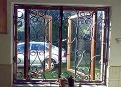 Vertical traditional spanish picturesque barred window with blind in spain. Most Popular Sliding Window Grill Design Of Wrought Iron ...