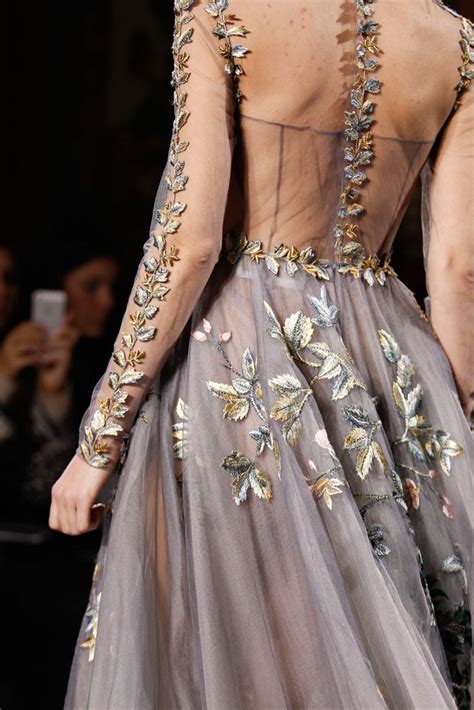 The Appliqué On The Sheer Top Of This Dress Makes This A Really Special