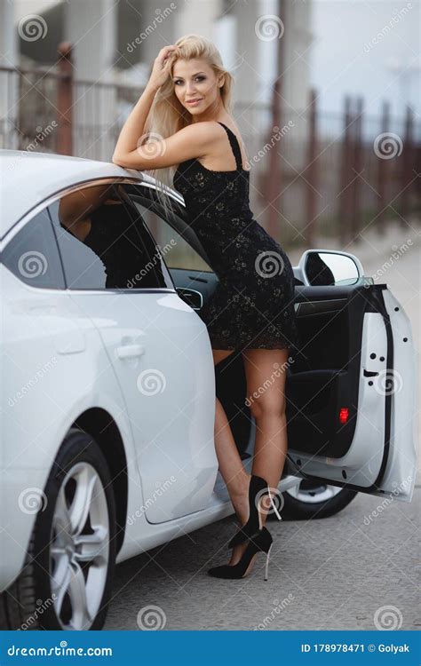 Portrait Of A Beautiful Blonde Girl Outdoors In Summer Near A Car Stock Image Image Of Model
