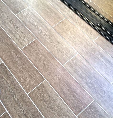 And, be sure not to mix and match reds as these usually do not work out right. tile wood look with grout | Wood tile, Flooring, Hardwood ...