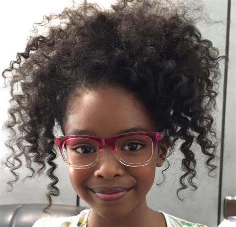 Here we have a picture showing us this hairstyle, and the ribbon in the side is the perfect choice of accessory. 13 Natural Hairstyles for Kids With Long or Short Hair