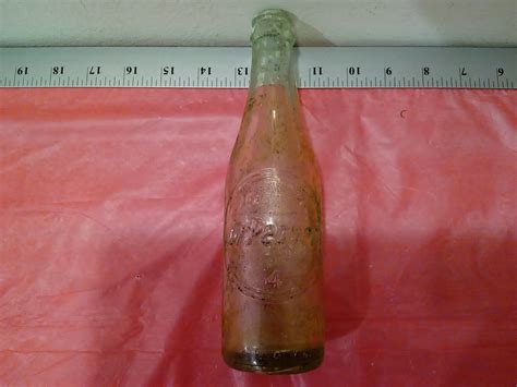 Vintage Dr Pepper Embossed Bottle Dr Pepper On One Side And 10 2 4