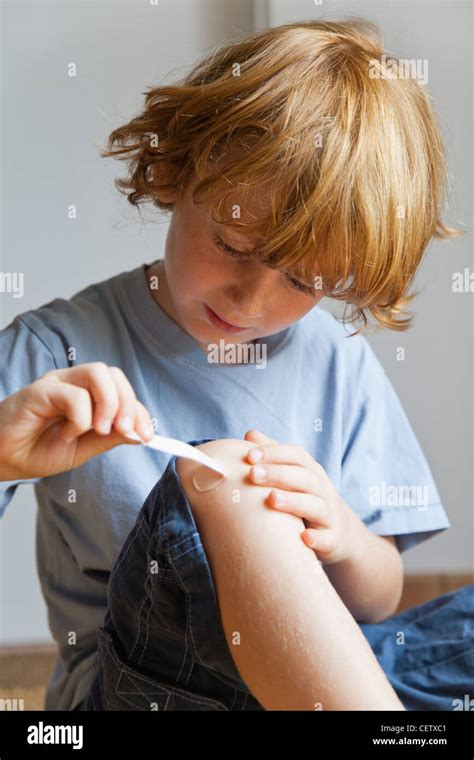 Adhesive Bandage Kid High Resolution Stock Photography And Images Alamy