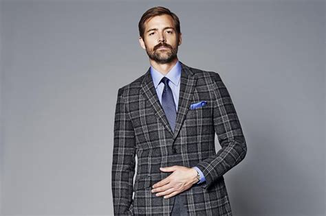 Prices range from 2.50 pounds for a pair of socks to 185 pounds for a peacoat. SAVILE ROW TAILOR PATRICK GRANT FOR DEBENHAMS