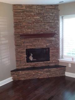 This basic gas fireplace was in need of some aesthetic help! Custom Corner Stone Direct Fireplace - Craftsman - Family ...