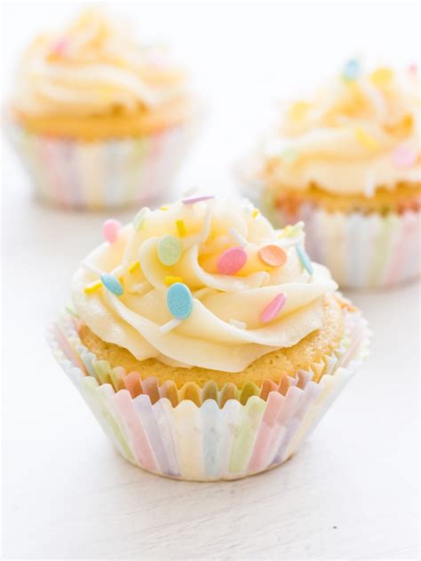 Place cupcake papers in a cupcake pan. Best Vanilla Cupcakes | If You Give a Blonde a Kitchen