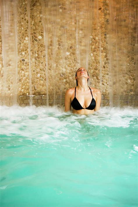 Woman Relaxing At A Spa In The Hot Tub Photograph By Corey Hendrickson Fine Art America