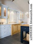 They are elegant and excellent. White plates on rack above double white ceramic sink in ...