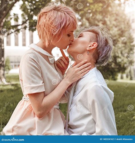 Beautiful Lesbian Couple Hugging Love And Passion Between The Two Girls Stock Photo