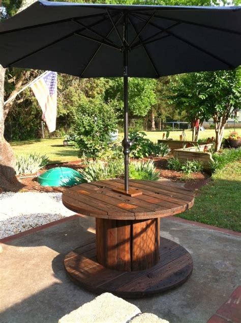 Wooden cable spool table - 40+ upcycled furniture ideas