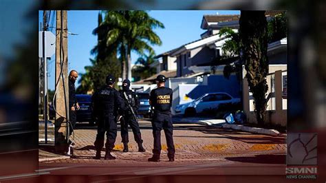 brazilian police raid bolsonaro s home seizes phone