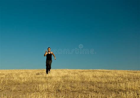 Handsome Asian Man Running In The Barley Meadow In Stock Photo Image