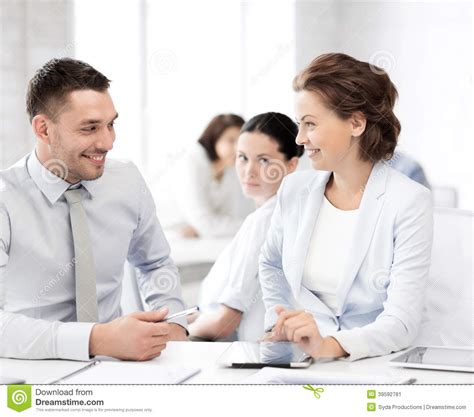 Usiness Colleagues Talking In Office Stock Image Image Of Concept