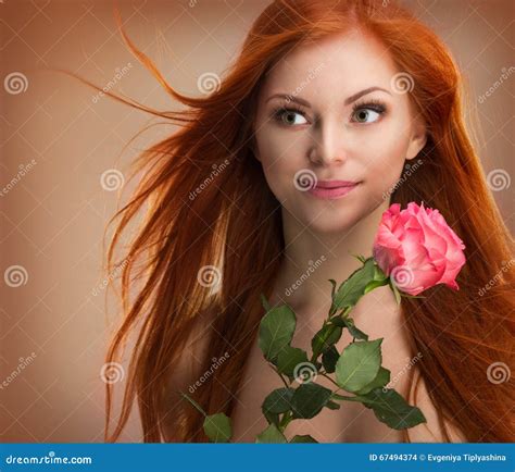 Beautiful Red Haired Woman Stock Photo Image Of Flower 67494374