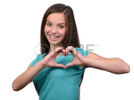 A Woman Making A Heart Shape With Her Hands