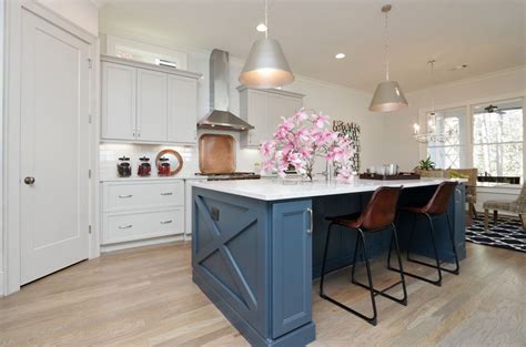 Example of a transitional galley dark wood floor and brown floor kitchen design in other with an undermount sink, shaker cabinets, green cabinets, white backsplash, stainless steel appliances, an island and white countertops love this, a little modern but. Kitchen with dark blue island and seating. | Kitchen, Home ...