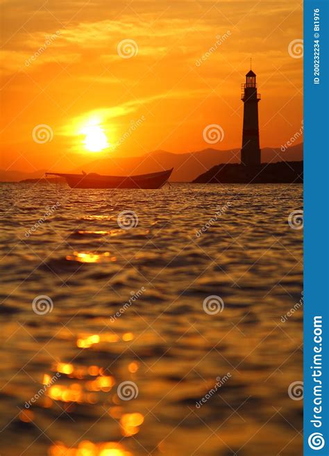 Seascape At Sunset Lighthouse On The Coast Stock Photo Image Of Wave