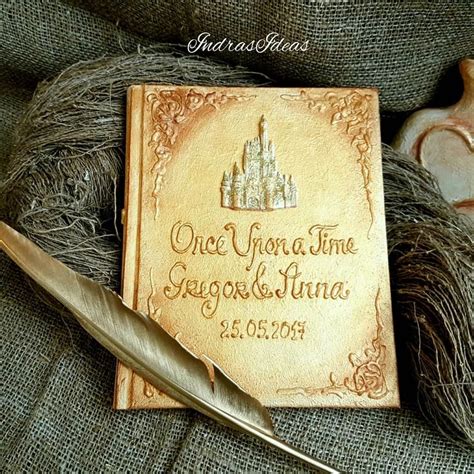 The names of the happy couple, the date of their wedding, and the wedding venue is beautifully embossed on the. Fairy Tale Wedding Guest Book, Personalized Guest book ...