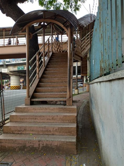 Footbridge Stairs Taking Over Most Of The Sidewalk Near Gma Kamuning