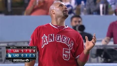 Albert Pujols Shows Up Yasiel Puig By Tagging Up And