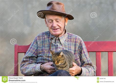 Old Man With Cat Royalty Free Stock Photos Image 35282748