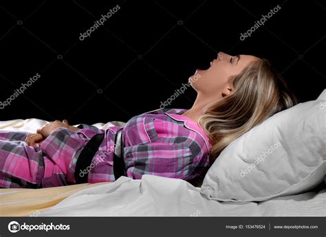 Screaming Girl Tied With Belt In Bed Sleep Paralysis Concept Stock