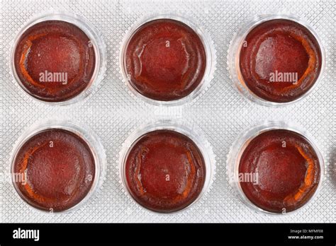 Six Red Tablets To Increase Hemoglobin In The Blood Are Packed In White