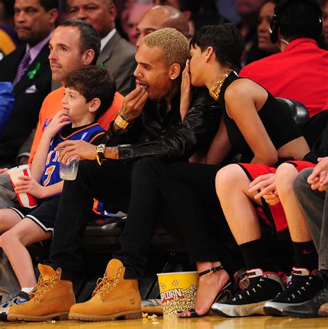 Brown was arrested following the incident. Rihanna and Chris Brown Snuggled Up at Lakers Christmas ...