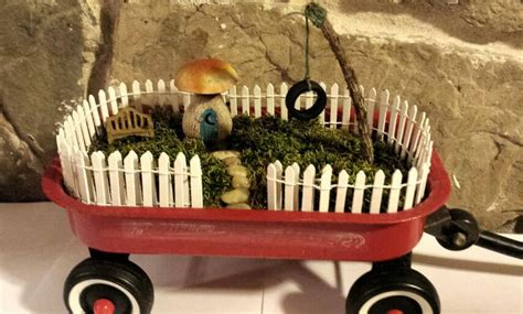 Fairy Garden In A Mini Radio Flyer Wagon Complete With A Tire Swing