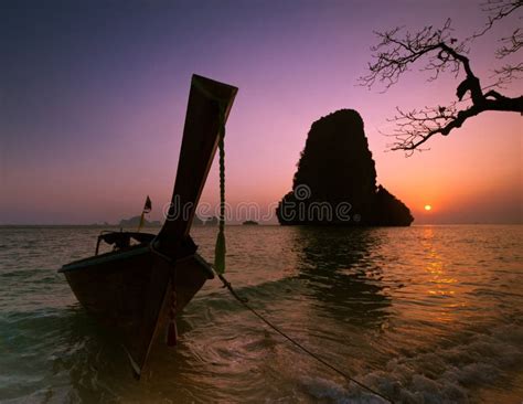 Sunset At Tropical Beach Landscape With Thai Traditional Boat An Stock