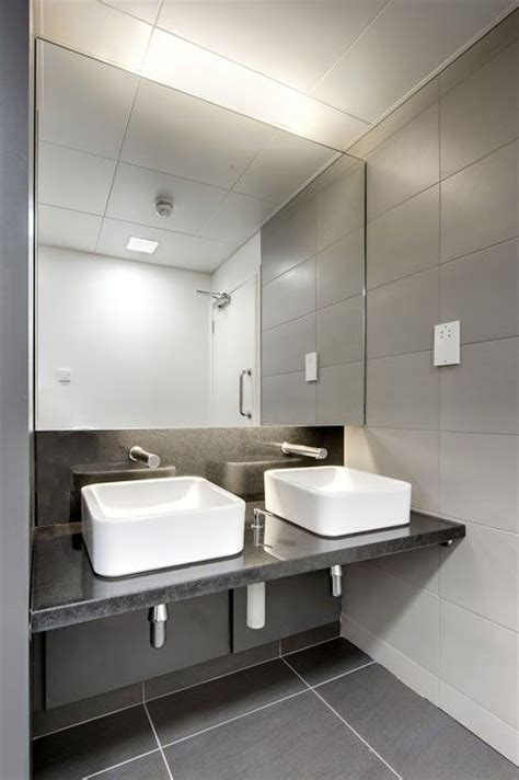 Inside the office restroom, i wash away my shame, regret and fear, and reemerge shiny and clean. Interior Photographer, Office bathroom, Princes Street ...