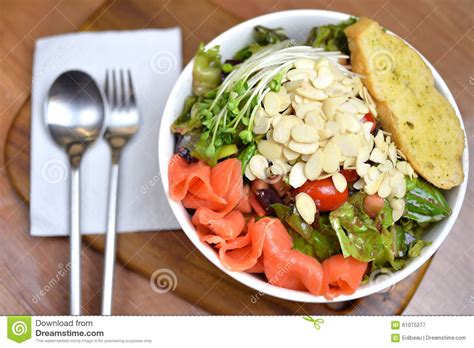 Today's salad recipe is an example of that, where the arugula is combined with salty and smoky salmon, creamy add four cups of arugula to a mixing bowl along with one cup of microgreens. Salmon Salad Bowl stock image. Image of lemon, salmon ...