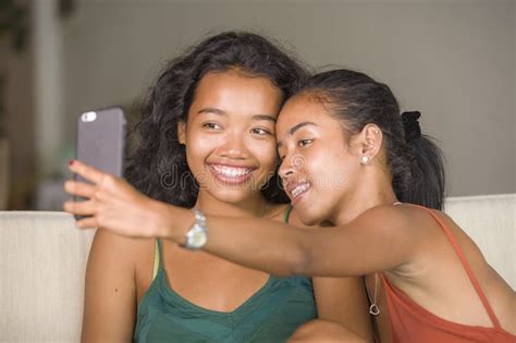Young Happy And Beautiful Asian Sisters Or Girlfriends Couple Smiling Cheerful Taking Selfie