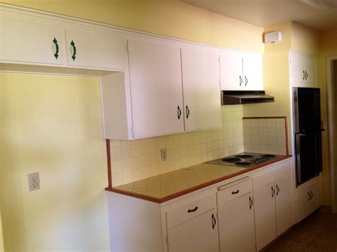 Mellow yellow photo by julian wass. Retro brown and yellow tile in new kitchen. Will re paint walls to match cabinets, but leaving ...