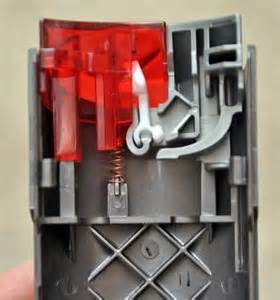 The small clear plastic prongs will not squeeze together enough to get it to slide into the two little here is a video which shows how to attach the bin lid cover on a dyson dc07 vacuum cleaner. While putting in a new dyson 17 power switch, a spring ...