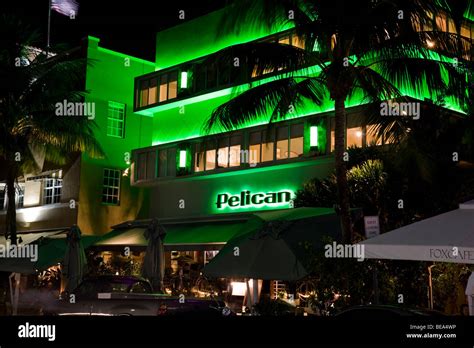 The Pelican Hotel Lit Up At Night In Neon South Beach Art Deco District Miami Florida Usa Stock