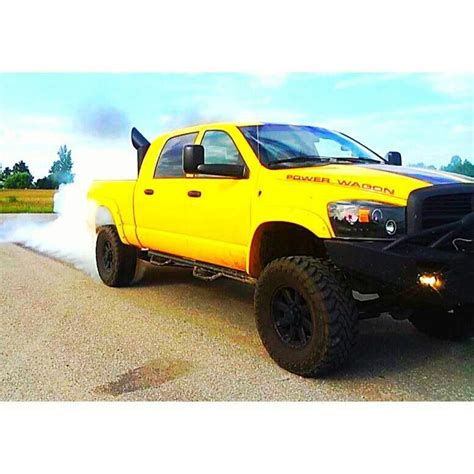 Cummins Yellow Dodge Power Wagon Crew Cab Black Stacks Lifted