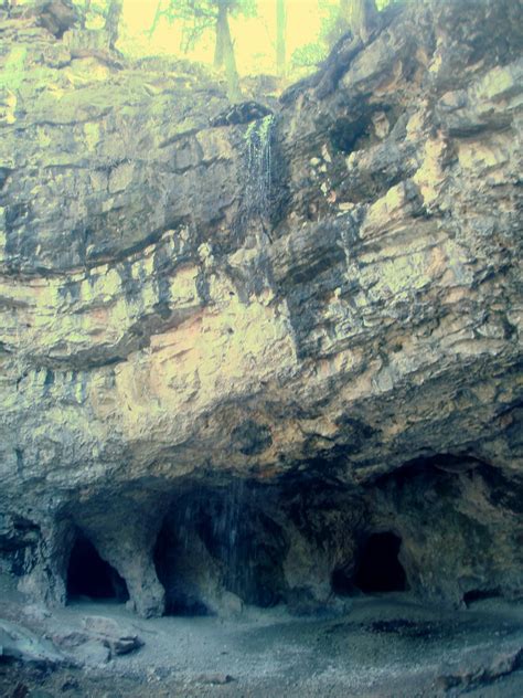 There Are Many Small Caves In The Rock