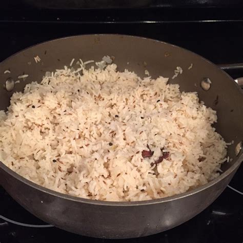 Aromatic basmati rice, cooked with onions and flavored with cloves, cinnamon, cardamom, cumin, mustard seed, chili and turmeric. Indian Style Basmati Rice Recipe | Allrecipes