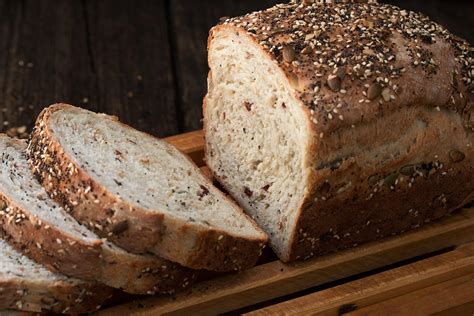 I was carrying a loaf of bread home today from my mother, who'd given it to me, when a guy comes up and offers me a pound for it. Seeded Multigrain Sandwich Bread - Seasons and Suppers