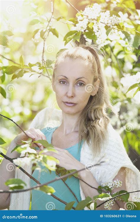 Young Attractive Woman Standing Near The Blossoming Apple Tree Stock Image Image Of Park